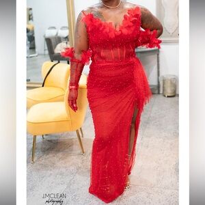 Custom red pearl gown.